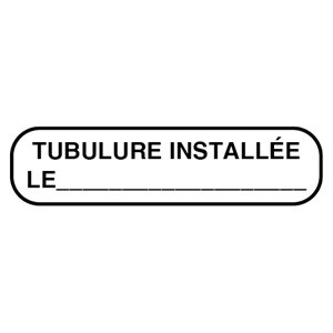 Label: “TUBULURE INSTALLÉE LE"